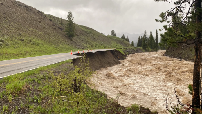 Flooding in Yellowstone causing damage to roadways.